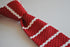 red skinny knitted tie with white stripes